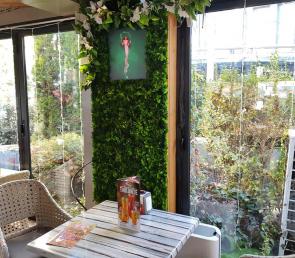 Grass green moss  wall "Hameleon" type at Happy Bar & Grill